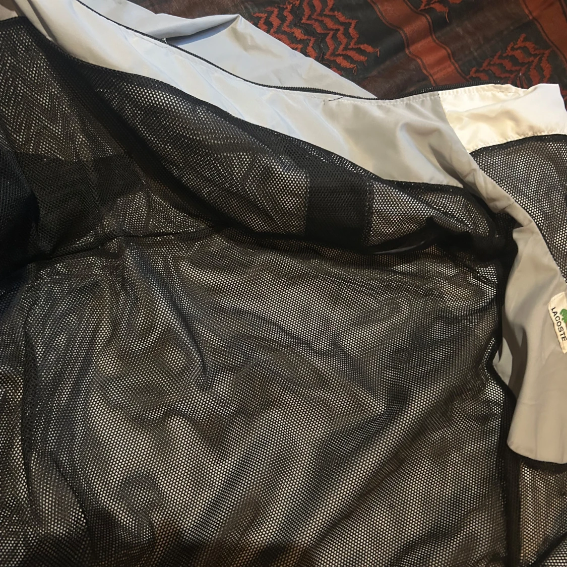 Lacoste vindjacka och byxor - 2