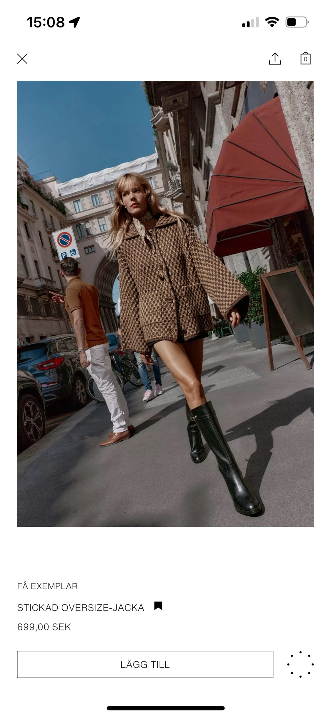 Brun rutig stickad jacka