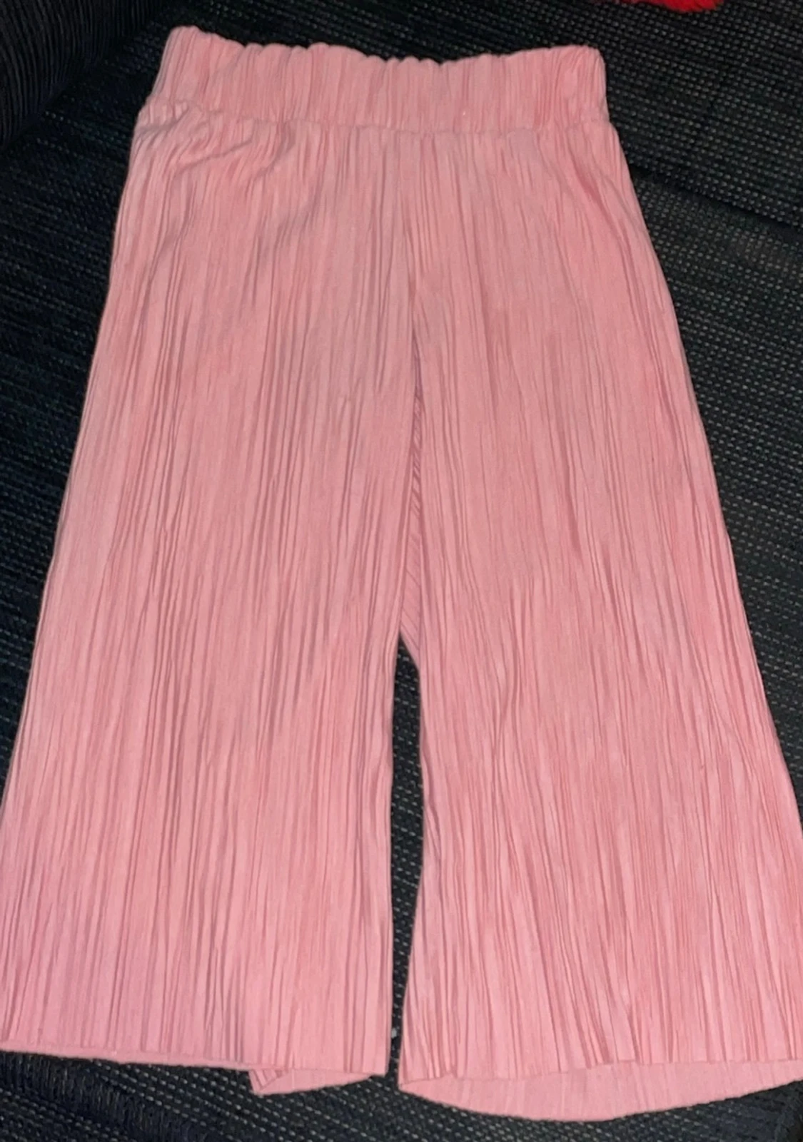 Plisserade rosa wide byxor