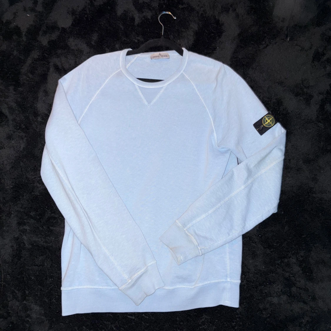 Ljusblå sweatshirt från Stone Island