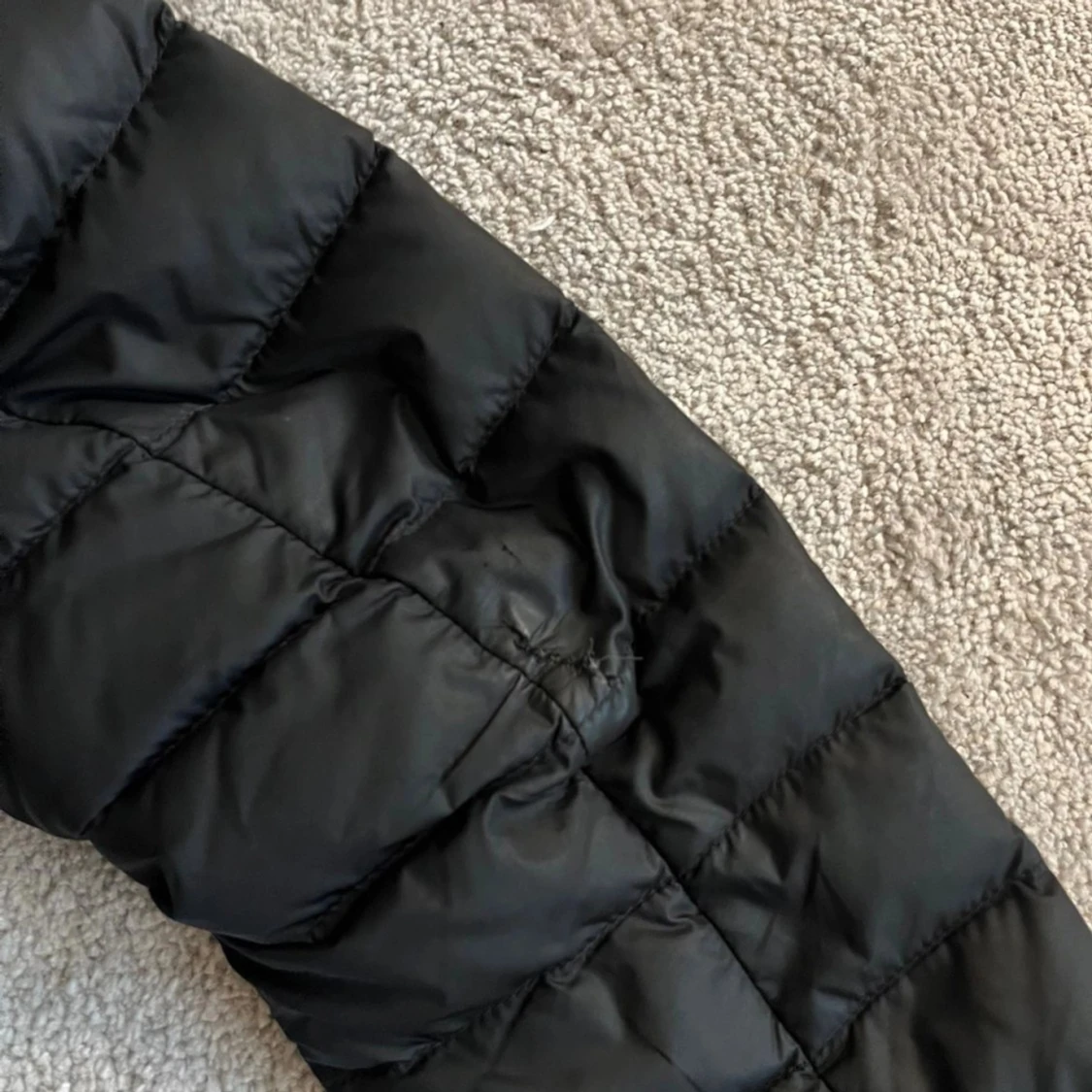 Svart dunjacka Peak Performance XS - 3