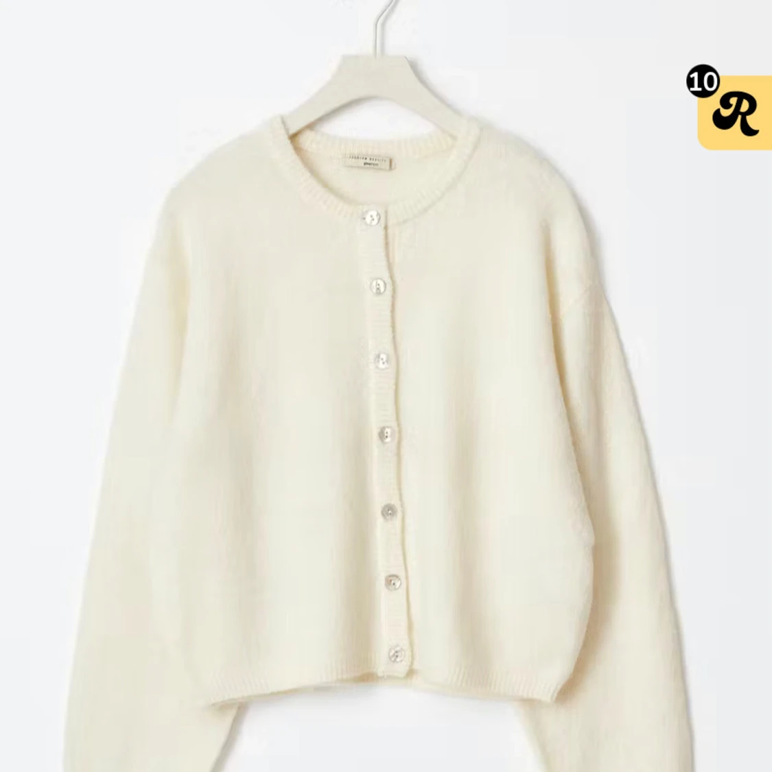 Krämvit kofta från Stradivarius - 1