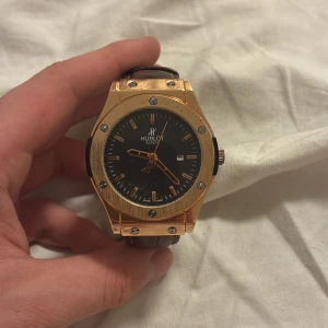 HublotClassic guld/brun herrklocka - Priset kan diskuteras vid snabb affär 