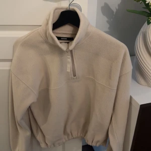 Fleecetröja med dragkedja  - Oanvänd, normal i storleken.