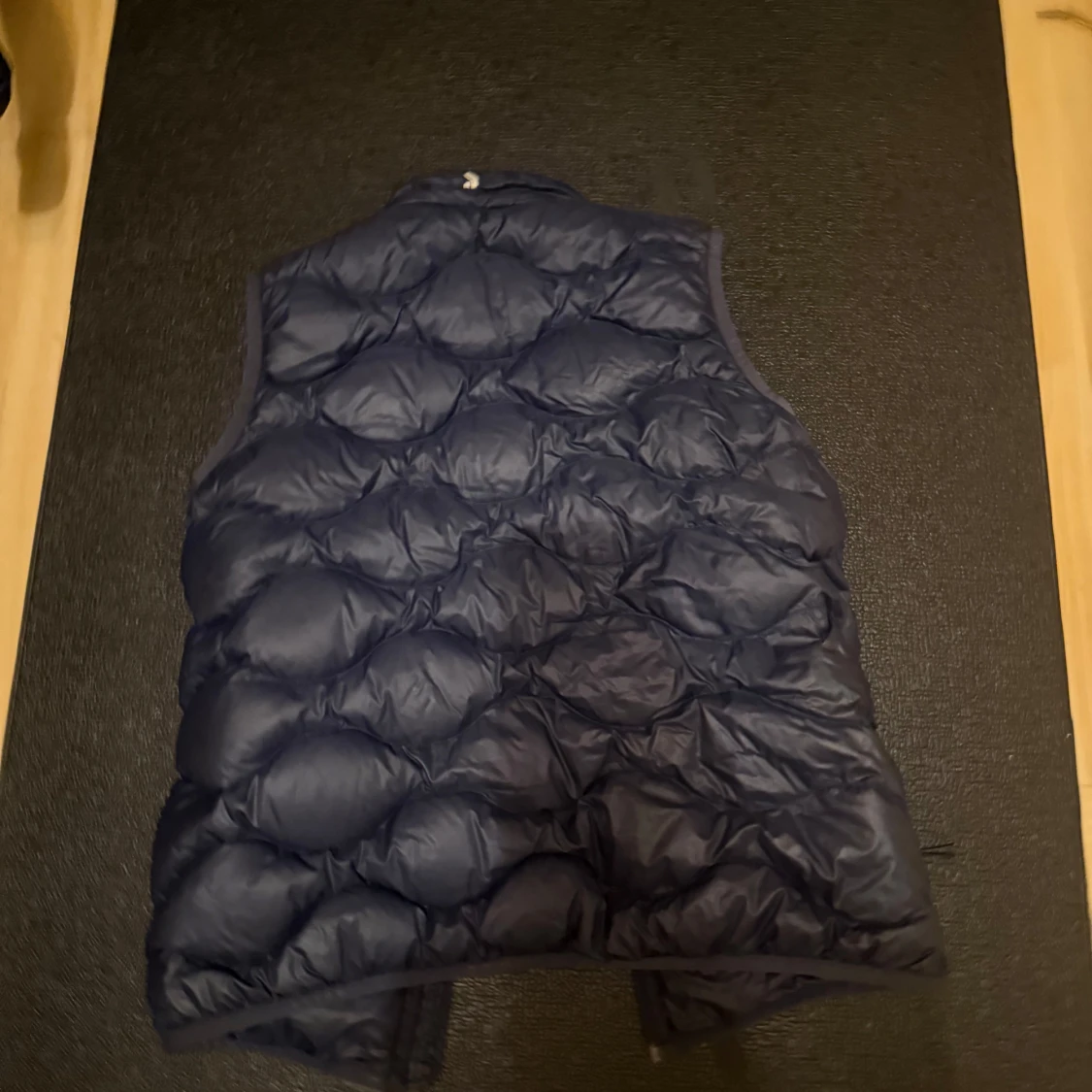 Mörkblå dunväst Peak Performance - 1