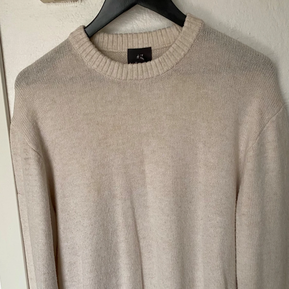 Beige stickad tröja från H&M