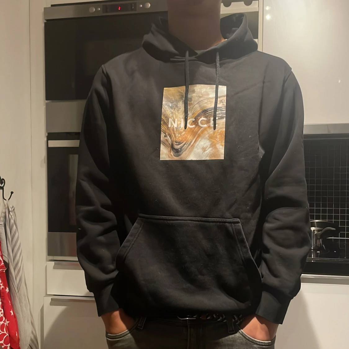 Svart hoodie från Nicce
