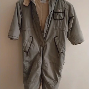 Mini A Ture  - Overall använd av ett barn 