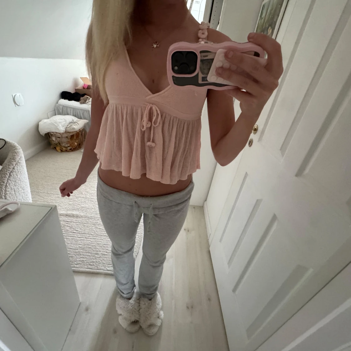 Ljusrosa ärmlös linnetopp med knyt - 1