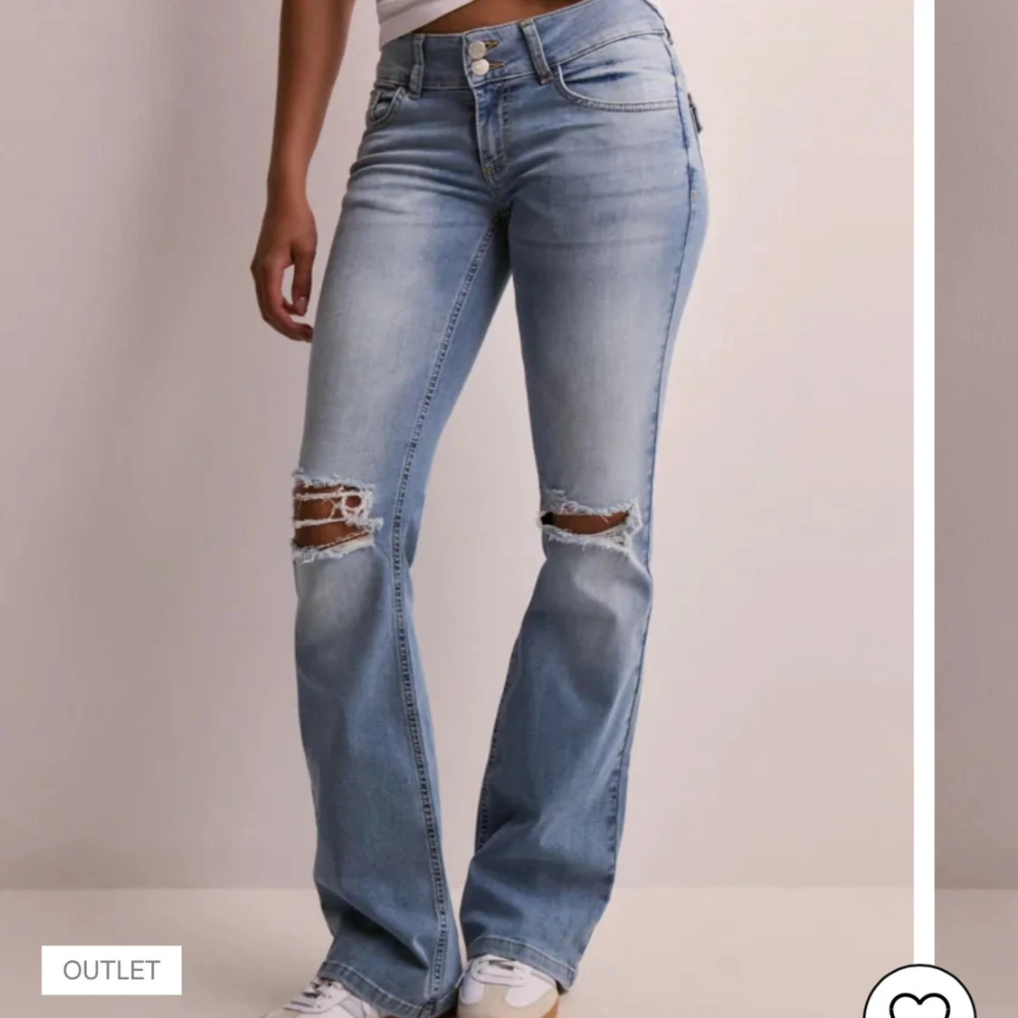 Ljusblå bootcut jeans med slitningar - 1