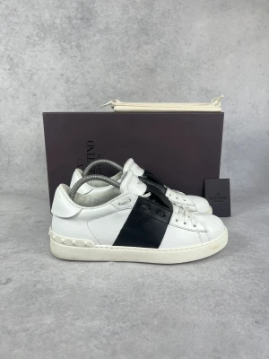Valentino  Open sneakers - – Condition: 9/10  – Color: White and black  – What is included: Box, dustbag and Valentino card  – Retail price: 