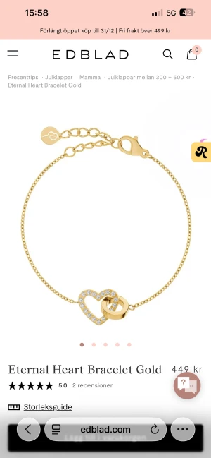 Eternal Heart armband från Edblad - Supersnyggt guldarmband från Edblad med ett hjärta dekorerat med gnistrande stenar och en rund ring som detalj. Tunt kedjearmband med justerbar längd och liten bricka med hjärtsymbol vid låset. Perfekt för dig som gillar stilrena smycken med en touch av bling. Säljer det då jag aldrig använder det 