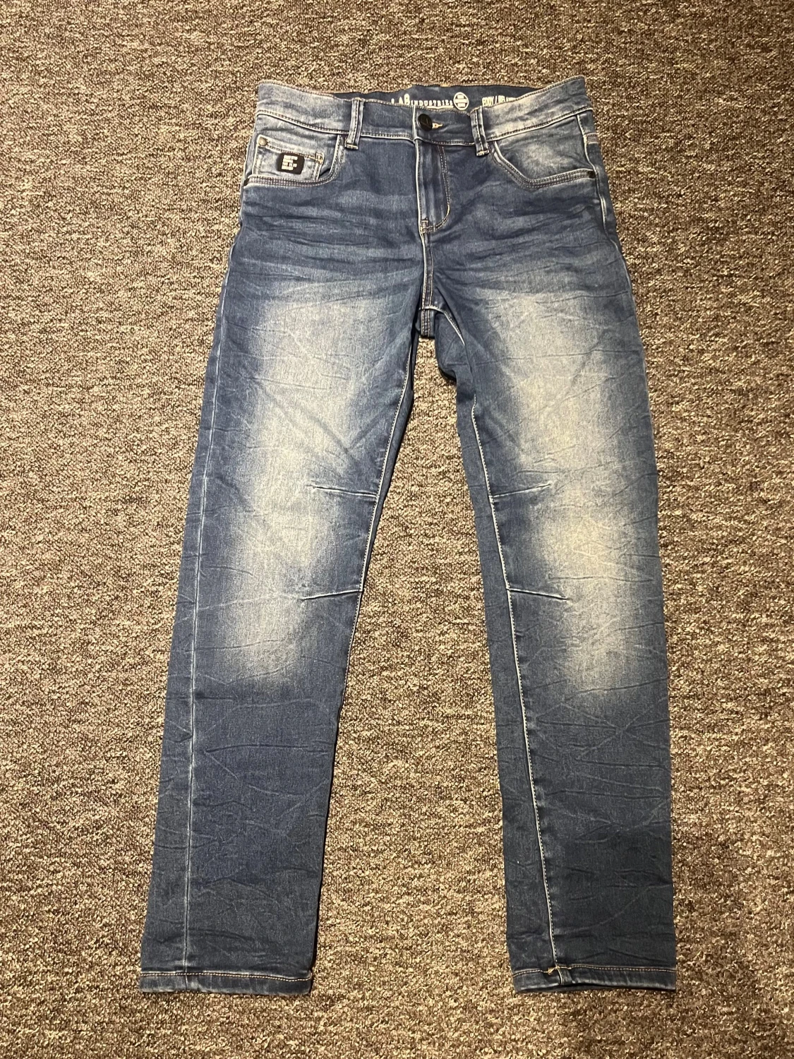 Blå jeansbyxor  - 2