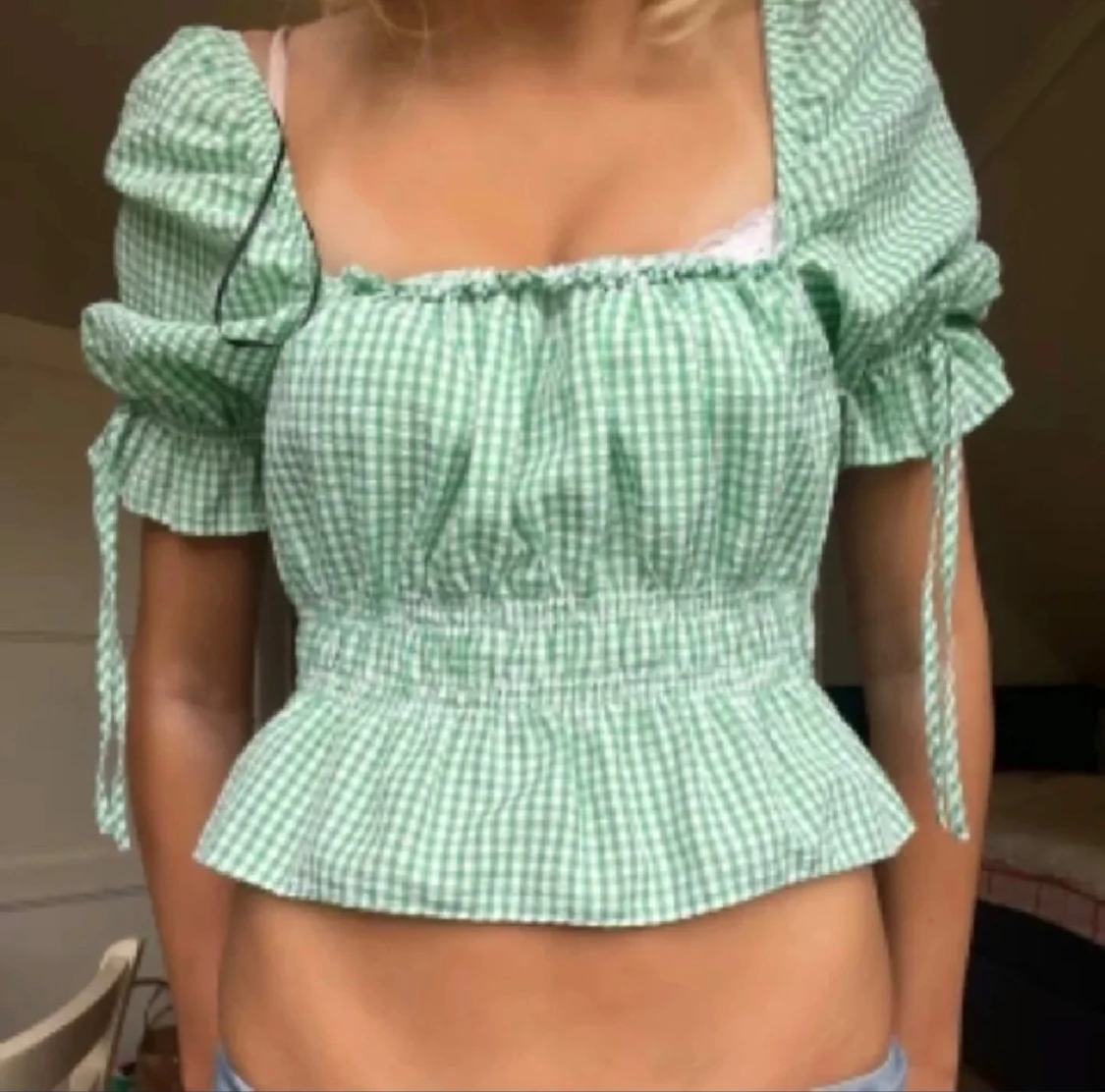Grön rutig blus med puffärm