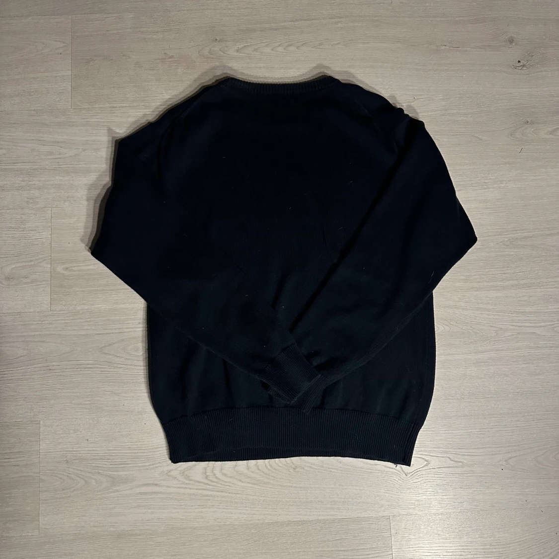 Mörkblå stickad gant  - 1