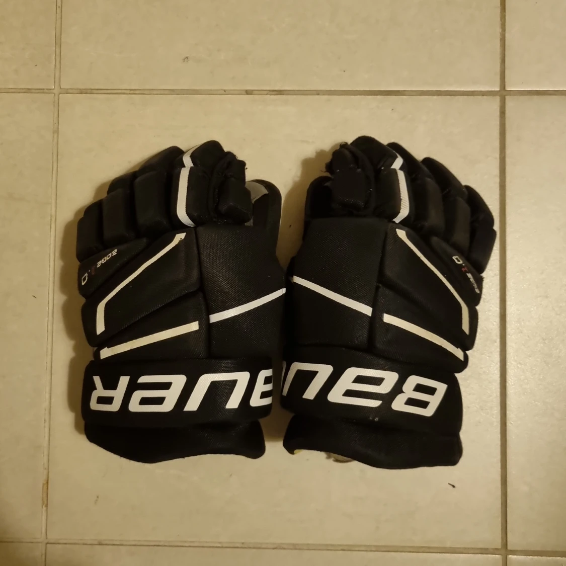 Svarta hockeyhandskar Bauer X CODE