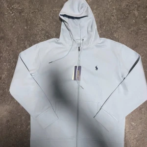 Polo Ralph Lauren Zip-up Hoodie - Never worn, brand new, runs a bit small.