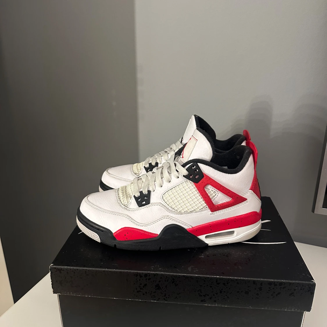Jordan 4 red cement