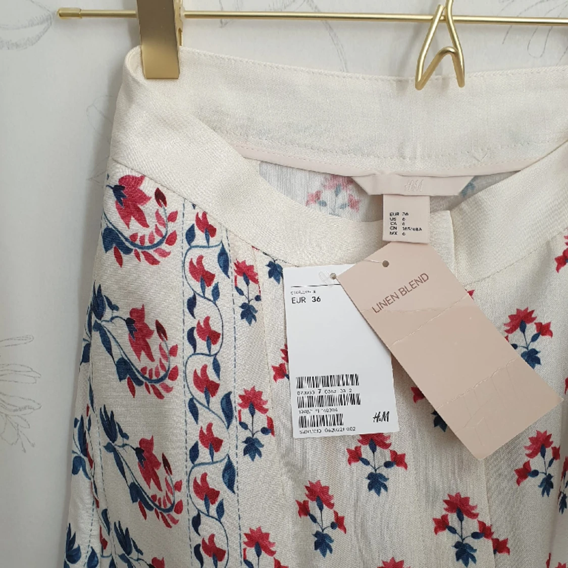 Vita blommönstrade byxor - 91