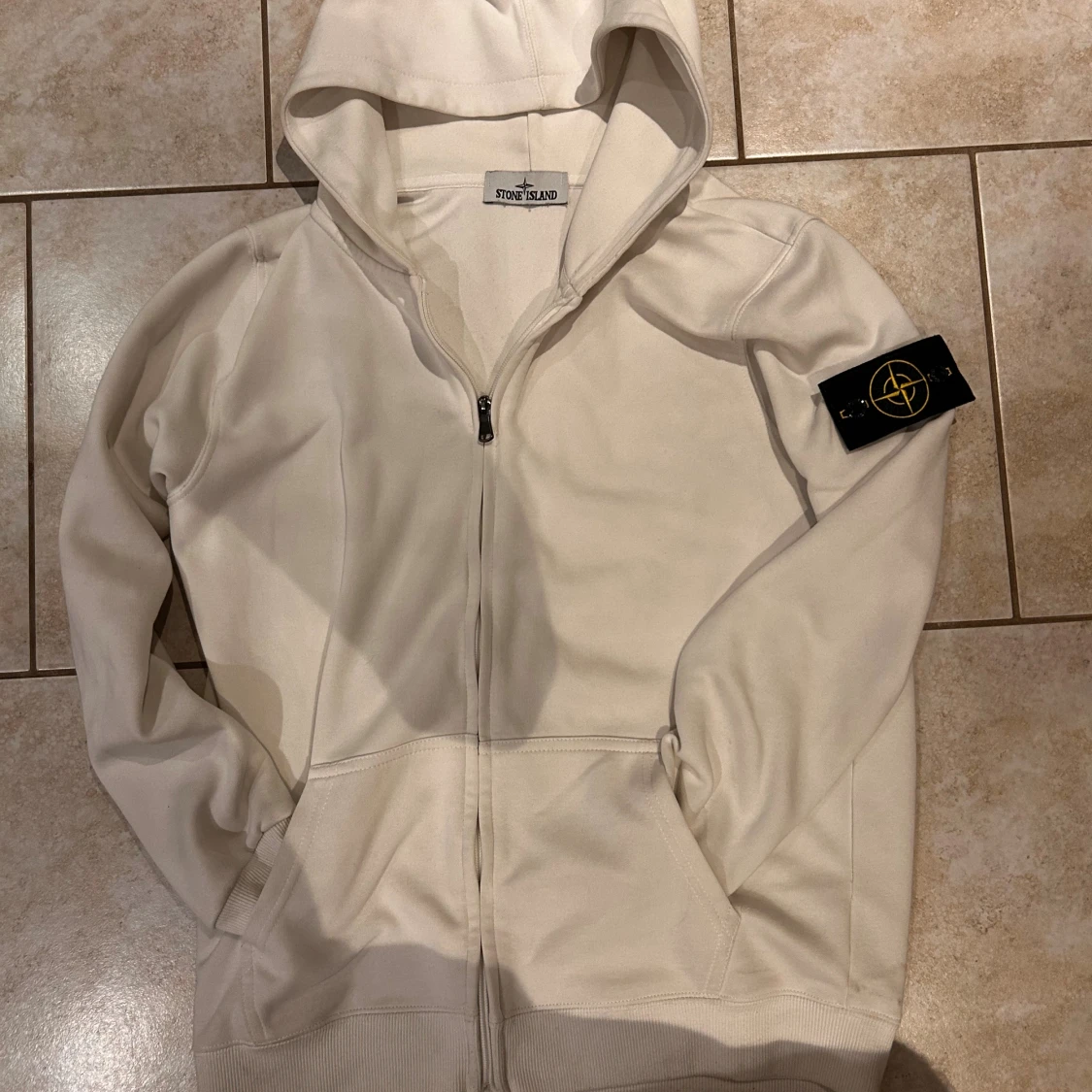 Vit hoodie från Stone Island