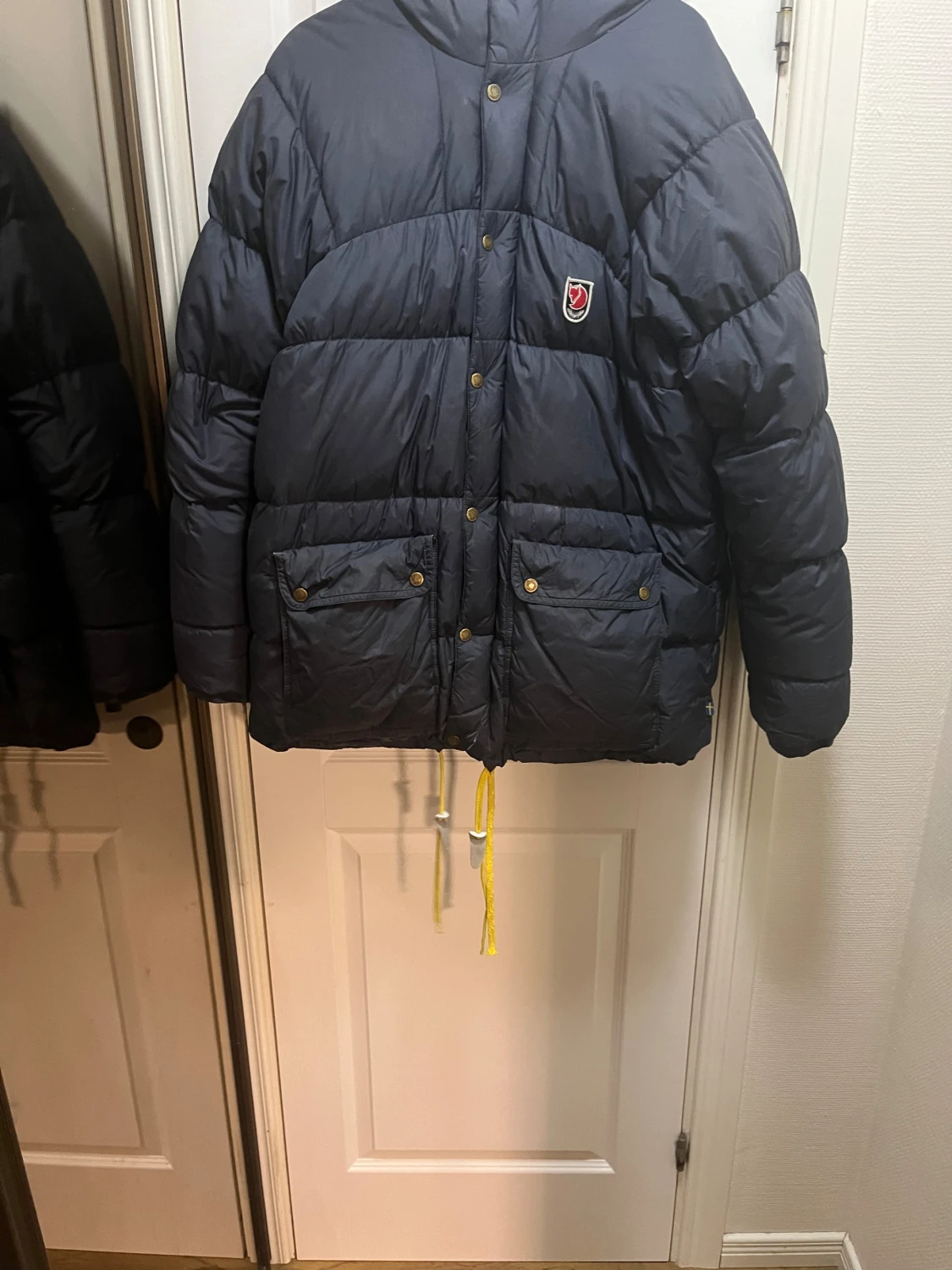 Mörkblå dunjacka från Fjällräven S