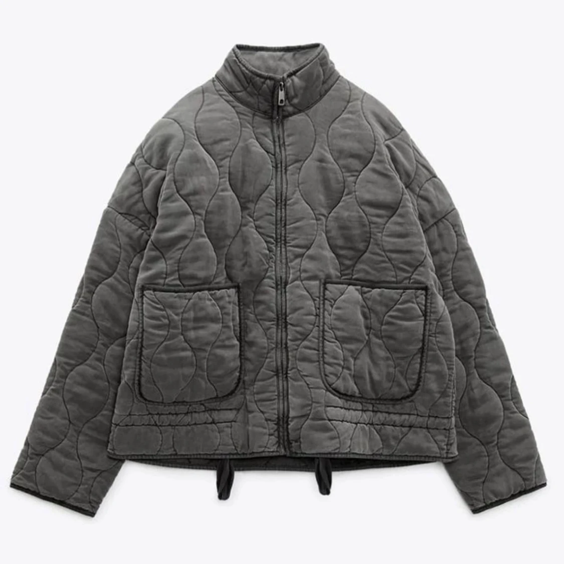 Grå quiltad jacka