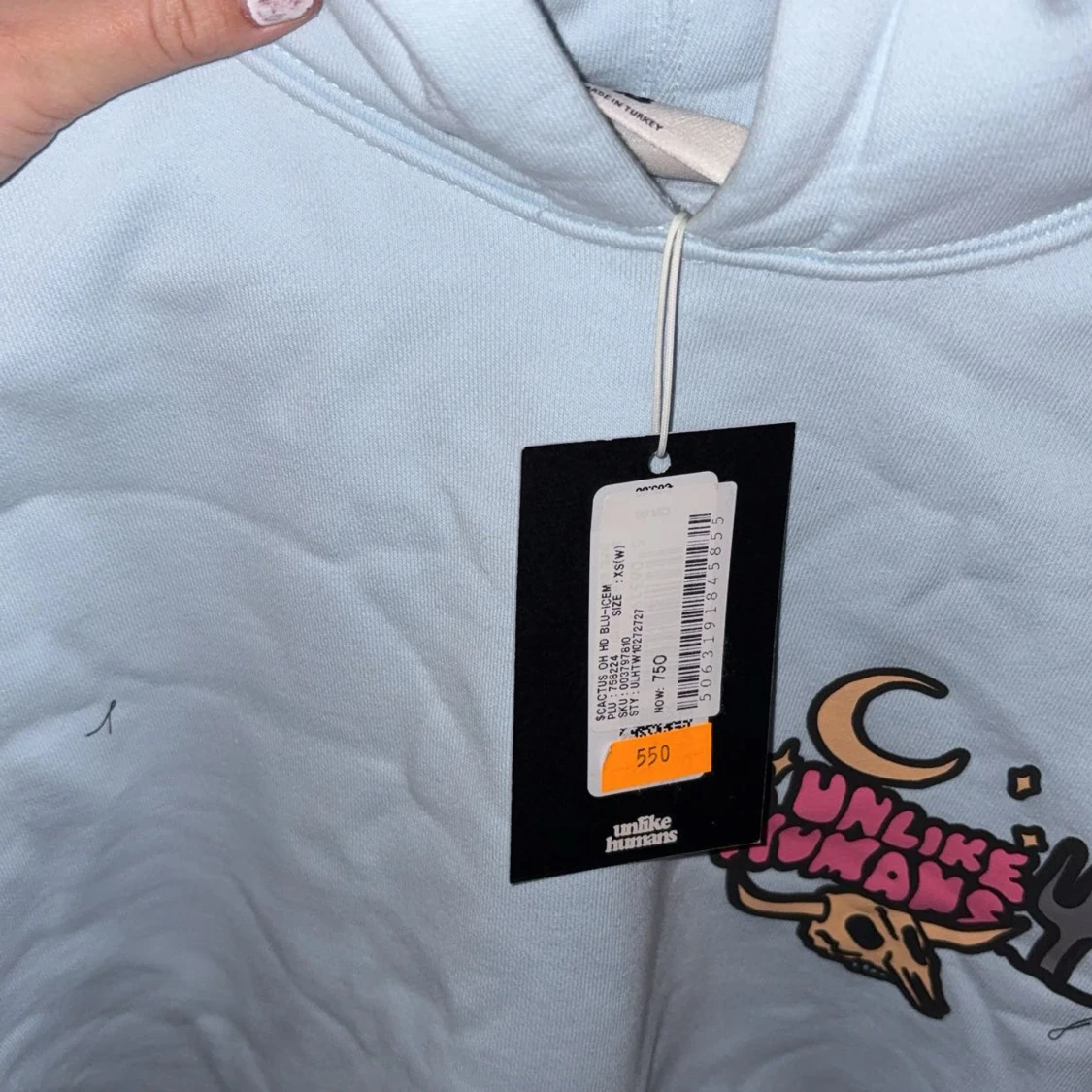 Ljusblå hoodie Unlike Humans