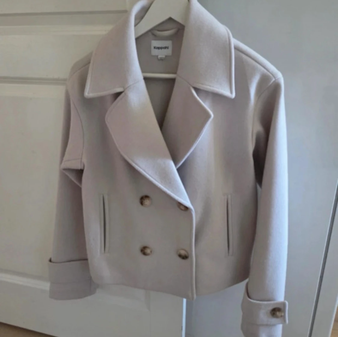 Beige skepparkavaj från Kappahl