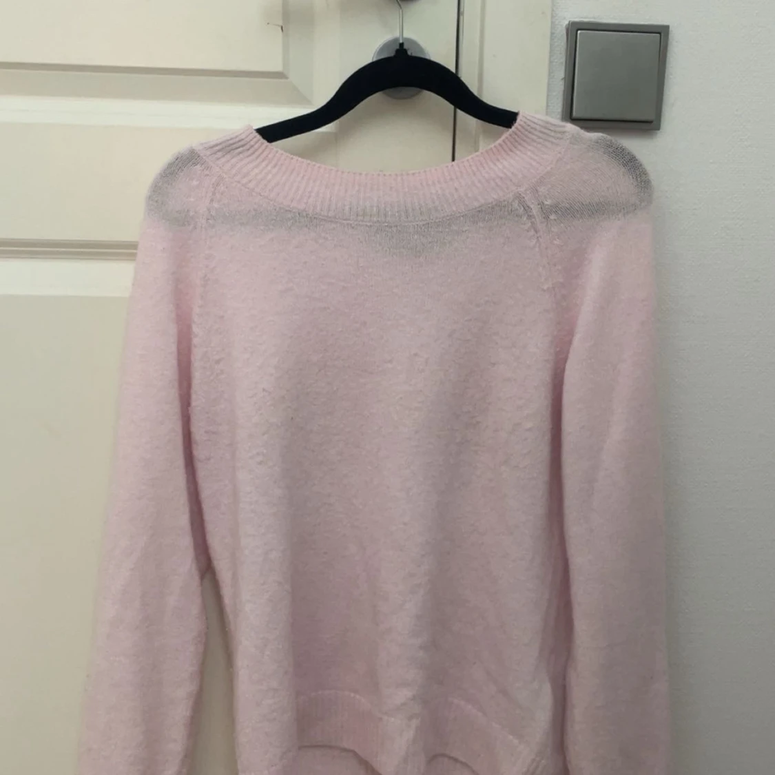 Ljusrosa stickad tröja 