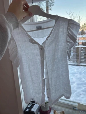 Linneblus - Kommer ej till användning, är 13-14 years sitter som en xs