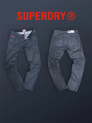 Vintage Superdry Jeans - Selling a pair of very rare vintage jeans!!! ||| Waist: 39cm, Thigh width: 23cm, Inner leg: 78cm, Leg opening: 17cm, 100% cotton  Let me know if you have any questions💫