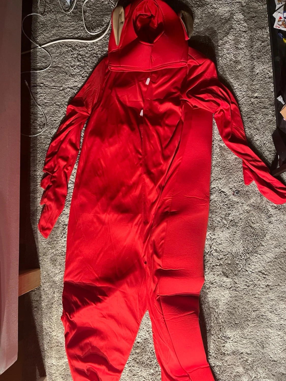 Röd teletubbies dräkt