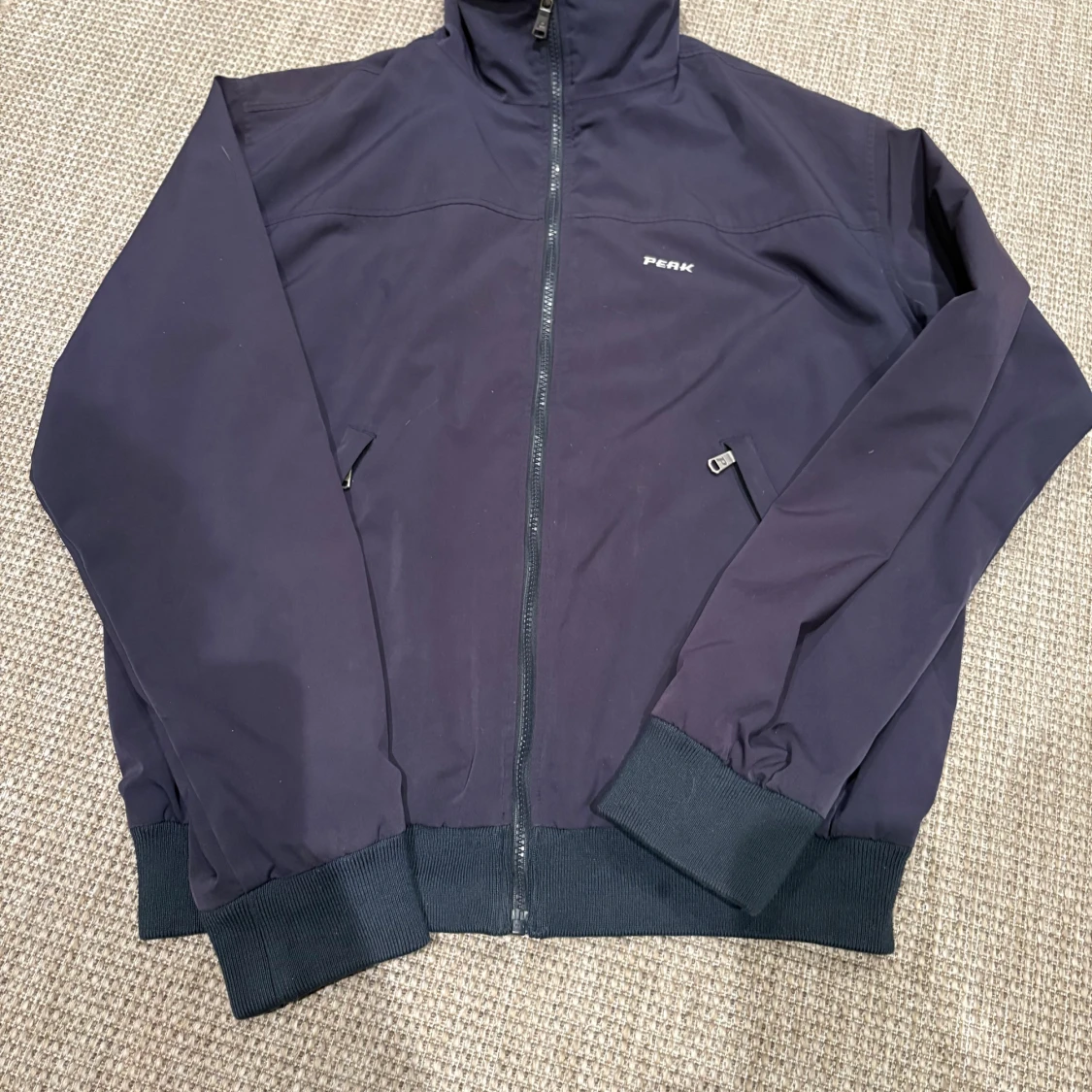 Mörkblå vindjacka Peak Performance L