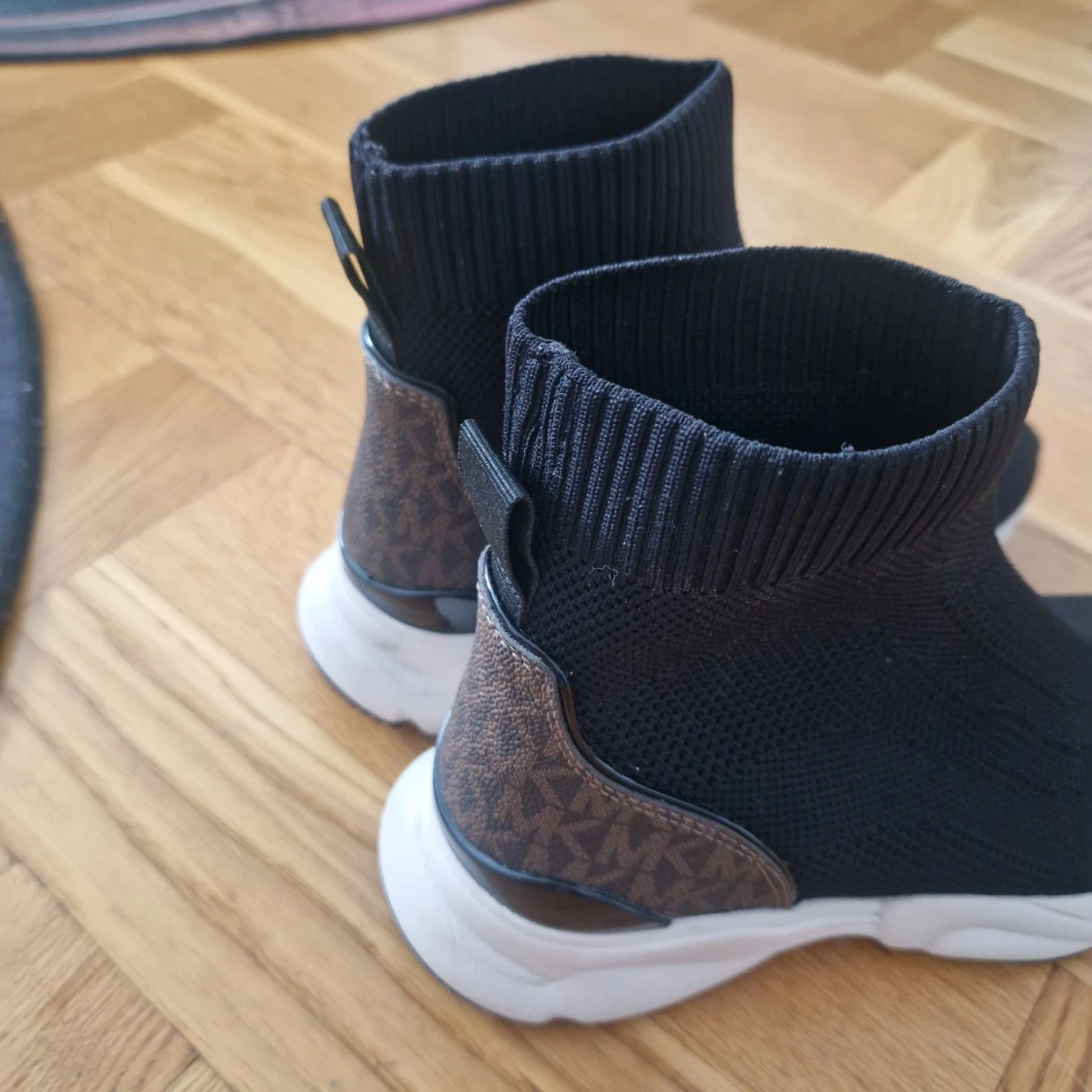 Svarta stickade sneakers Michael Kors - 1