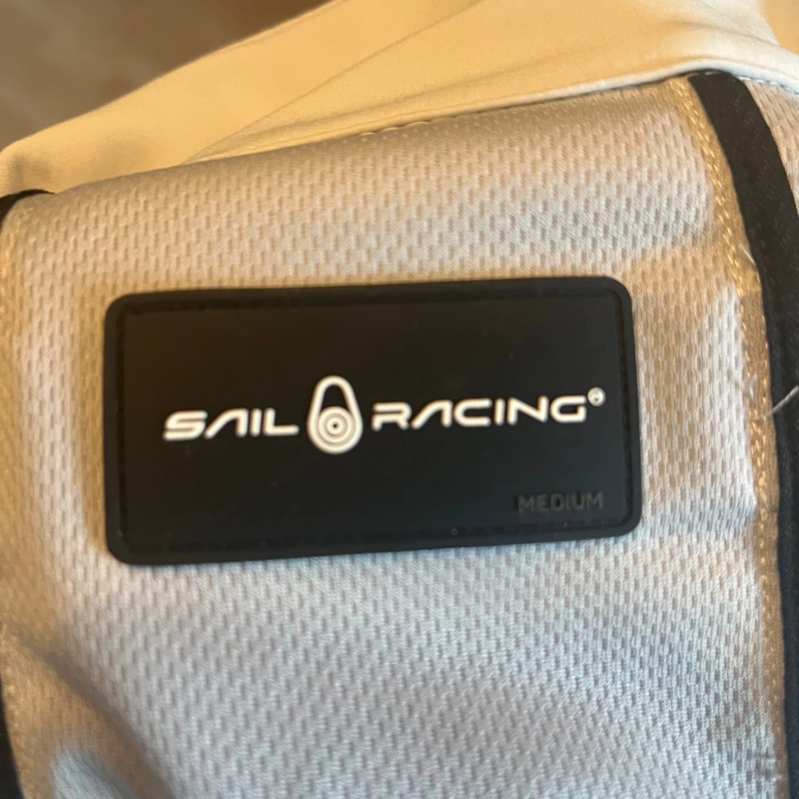 Vit vindjacka från Sail Racing  - 2