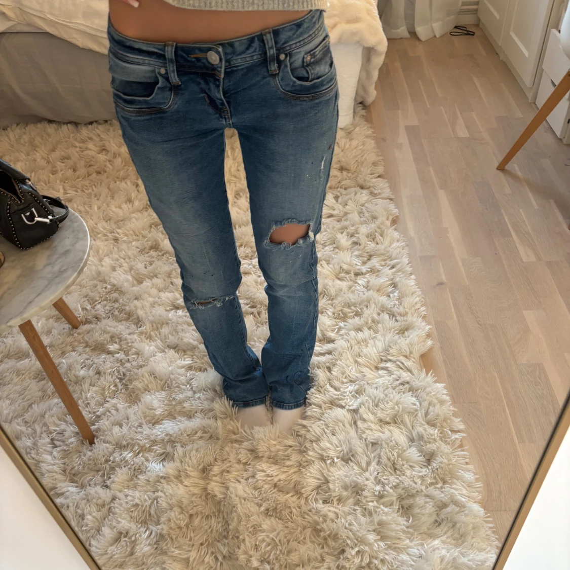 Blå slitna jeans från LTB W26 L30