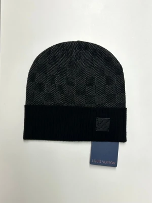 Lv Mössa - Helt ny aldrig använd. Storlek One size. Snabb frakt.
