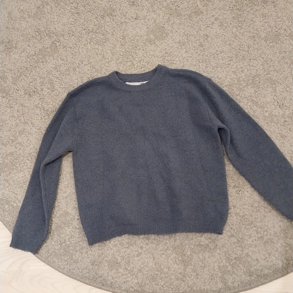 Blå stickad tröja från 157