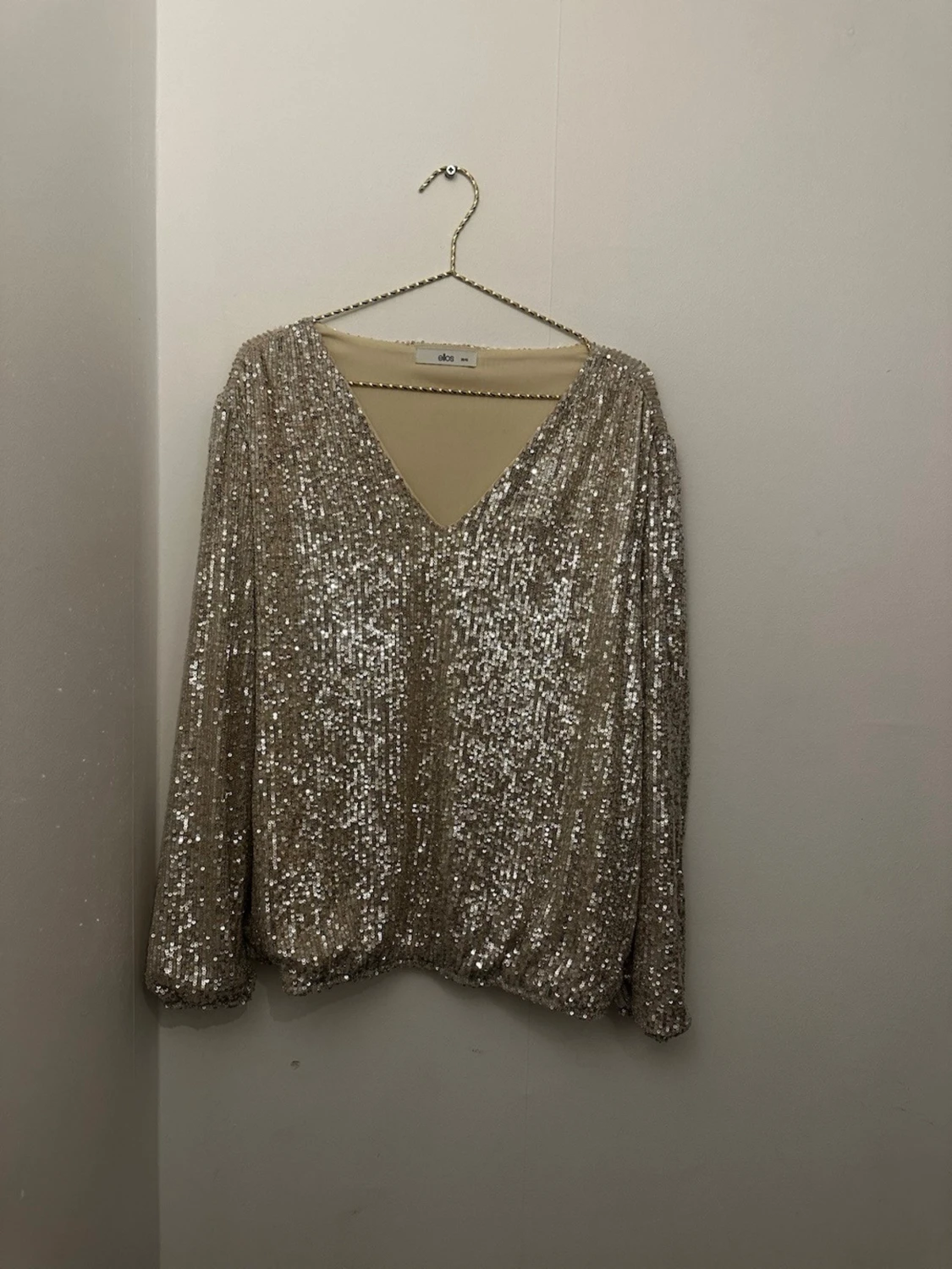 Snygg paljettblus stl. 38/40