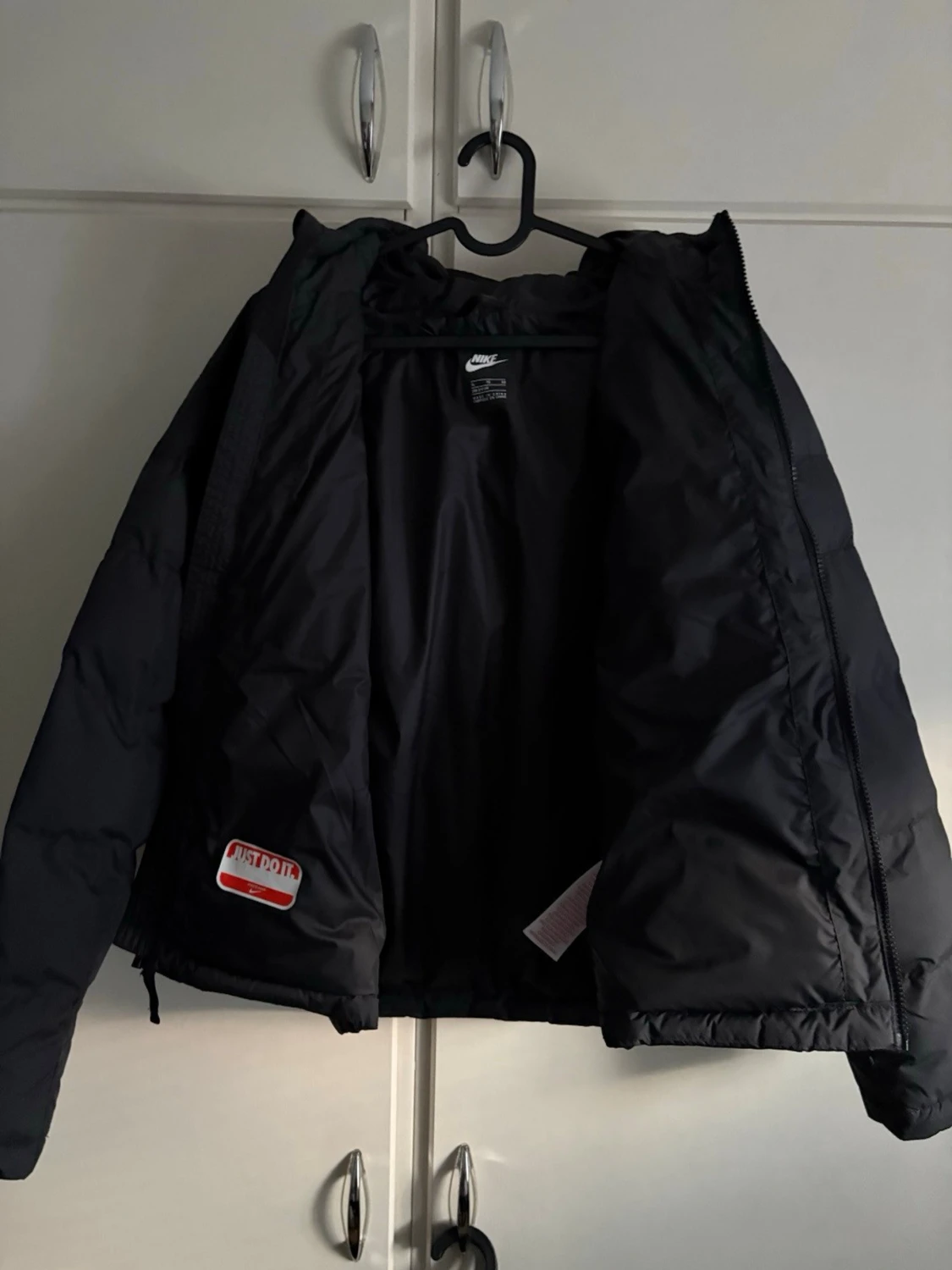 Svart pufferjacka från Nike XL Barn - 1