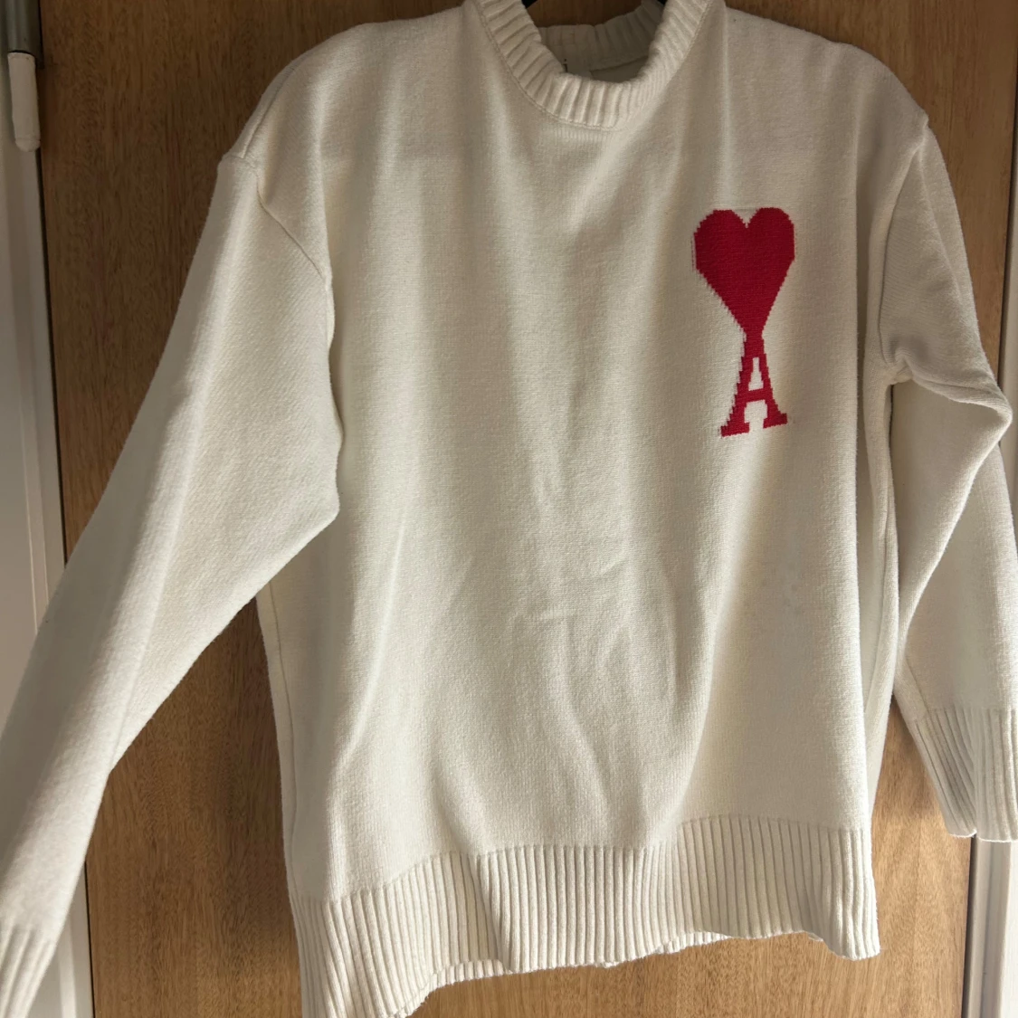 Vit stickad tröja från Ami