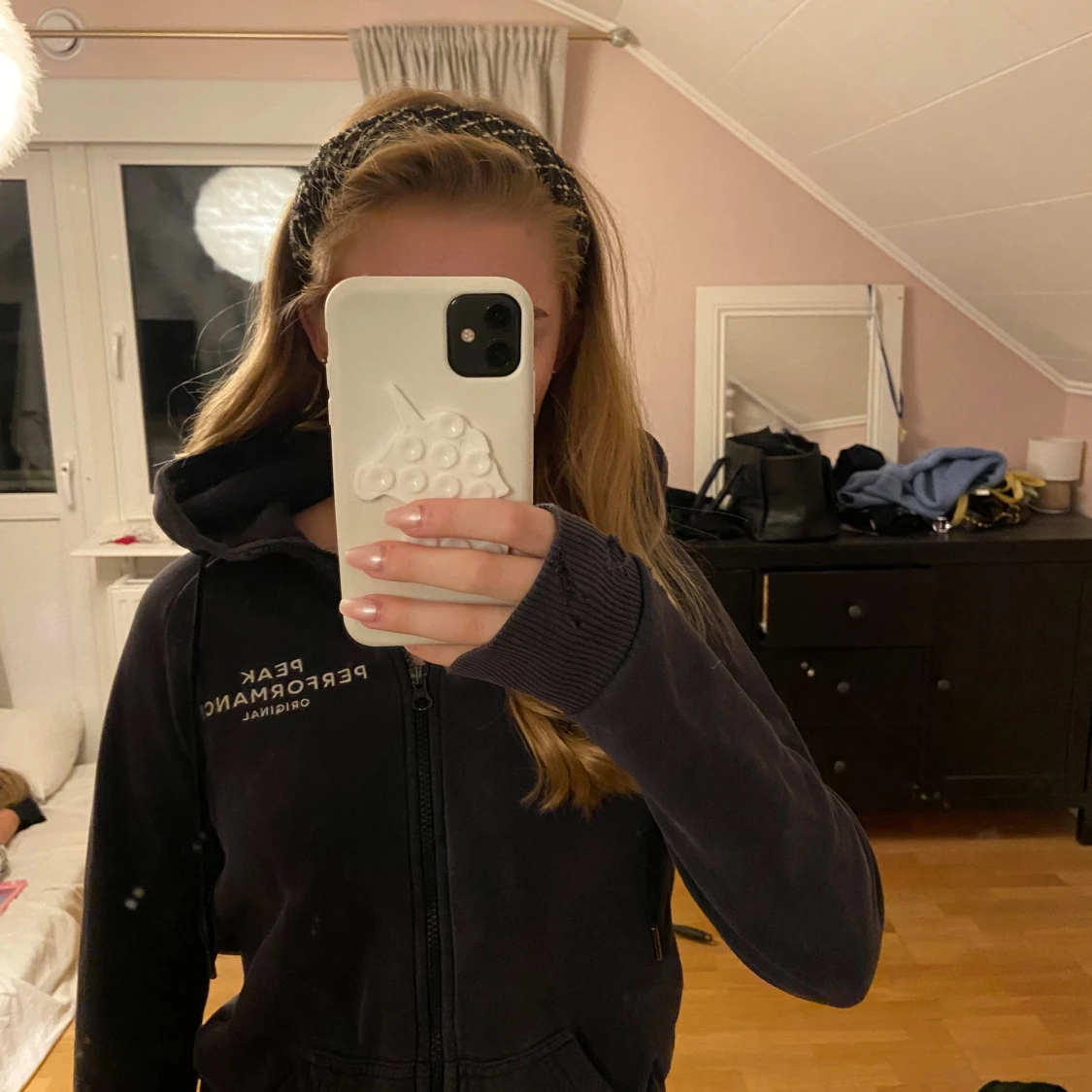 Svart hoodie Peak Performance XS