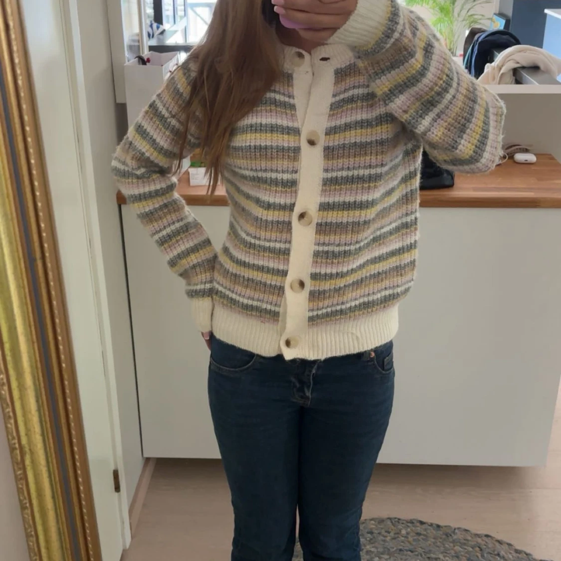 Randig kofta i pastellfärger