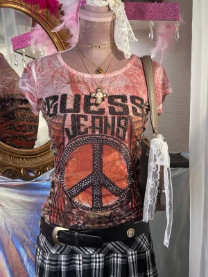 Rare Vintage Y2K Guess Jeans Peace Sign Graphic Tee  - Fitted Guess Jeans rare graphic tee featuring a sparkly peace sign with studs, sequins, and rhinestones on the front. Fit S-M Perfect vintage condition. 