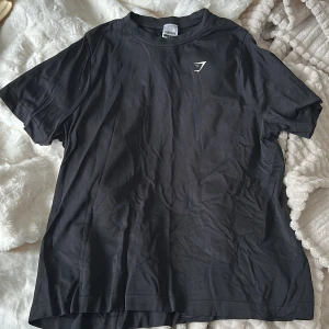 Gymshark tshirt - En träningströja från gymshark, nyskick endast använd en gång!