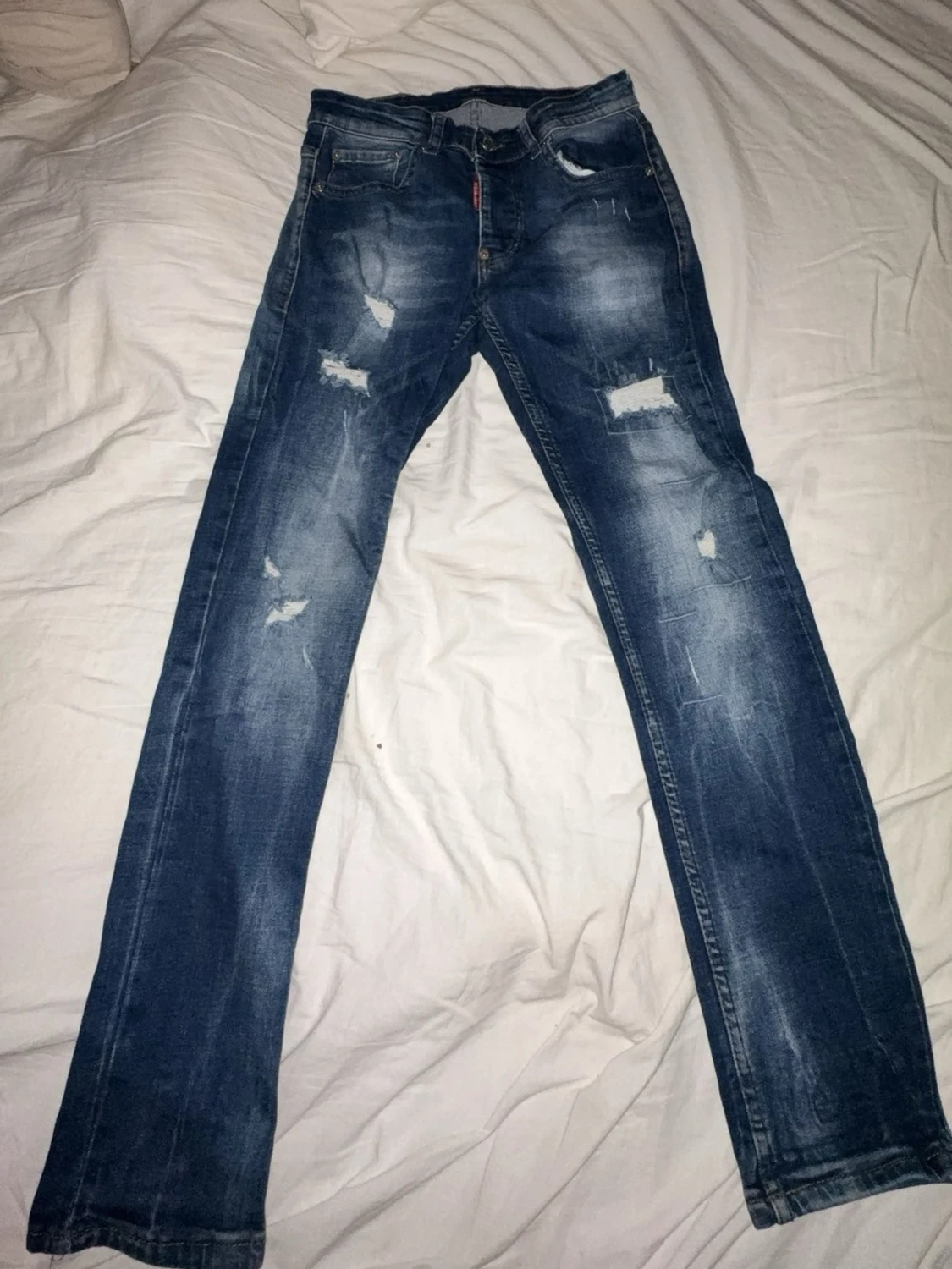 Blå distressed jeans från Dsquared2
