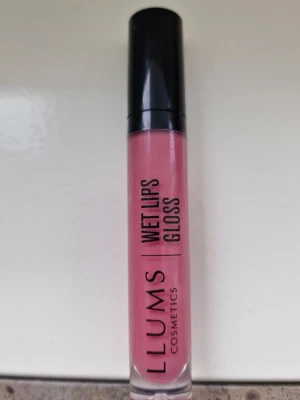 Llums Wet Lips Gloss - Llums Wet Lips Gloss i färgen Happy. Använd två gånger med den passar mig inte.