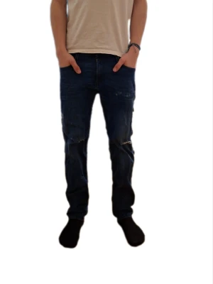 Replay anbass 29/L32 - Replay anbass 29/32 nerkortade så lite kortare 