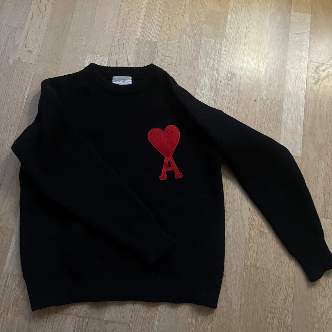 Svart stickad tröja från Ami Paris