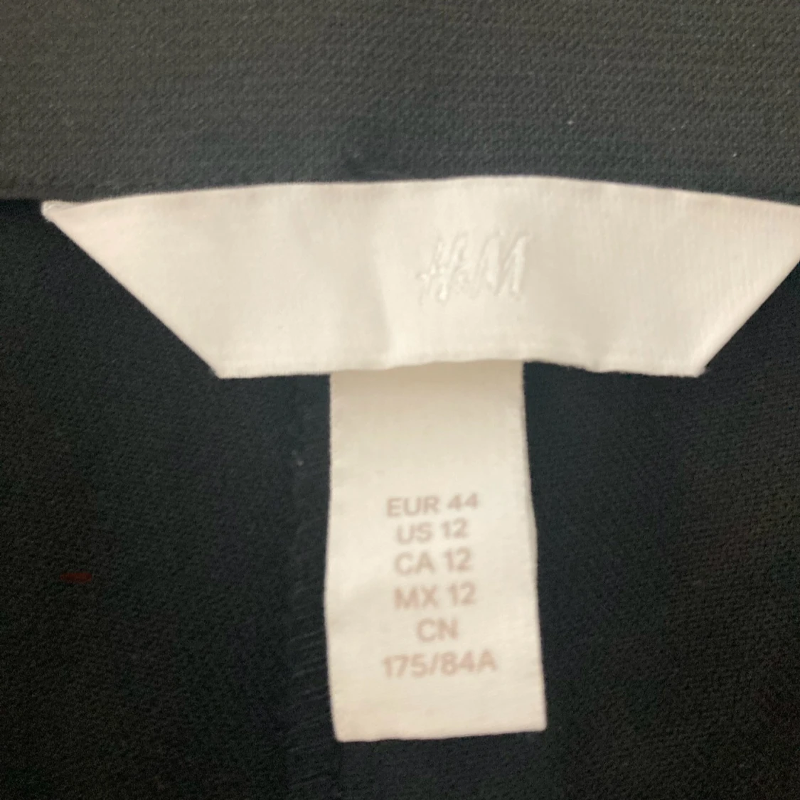 Svarta bootcut byxor från H&M - 1